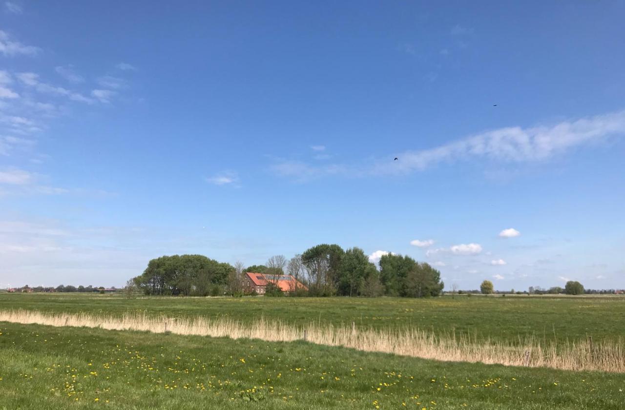 Ferienhof Spiegelhaus Krummhörn Esterno foto