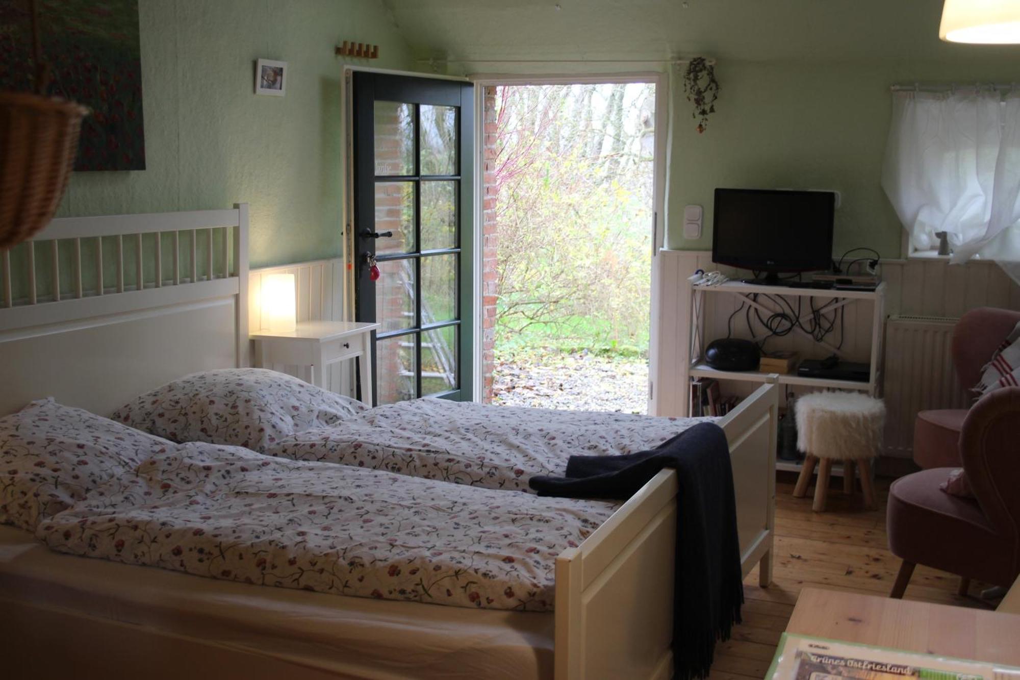 Ferienhof Spiegelhaus Krummhörn Esterno foto